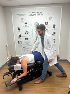 What Is Chiropractic Care? A Guide from Venice, FL 1 Chiropractor adjusting patient's back